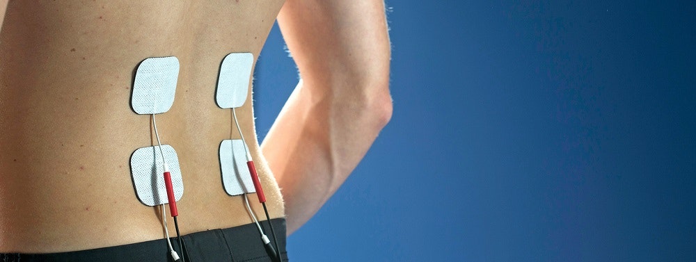 Electrical stimulation therapy for a herniated disc